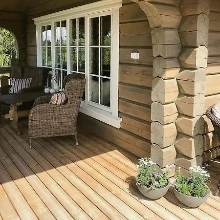 Log With Views Of Jotunheimen Mountains
